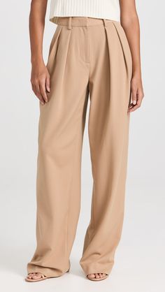 Fabric Stretch: StretchNon-StretchSuper-StretchFabric: Lightweight stretch twillPleated frontHook-and-eye closures at waist, zip flySlant hip pockets and welt back pocketsShell: 63% polyester/33% rayon/4% elastaneDry cleanImported, ChinaStyle #STAUD31739An extra-baggy pair of STAUD trousers with a comfortable yet polished look, crafted from supple suiting and accented with pleats and trouser-style pockets. Wide Leg Pleated Trousers, Pleated Trousers, Sneaker Jewelry, Medical Problems, Trouser Style, Pleated Pants, China Fashion, Polished Look, Wide Leg Trousers