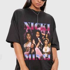 a woman wearing a t - shirt with the words nicki mina on it