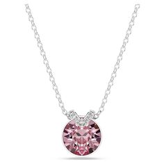 This romantic pendant has eye-catching appeal thanks to its central pink crystal set in rhodium plating. A flourish of shimmering pavé adds an extra layer of beauty, while the delicate chain exudes pure elegance. Wear it together with the matching earrings for a wondrous combination. V Pendant, Romantic Necklace, Pink Watch, Pure Elegance, Rose Gold Watches, Elegant Pendant, Crystal Set, Delicate Chain, Perfect Style