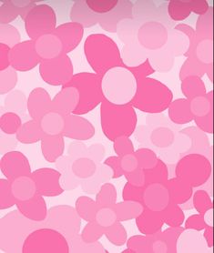 pink flowers are floating in the air