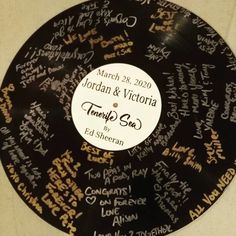 a black and gold record with writing all over it that says, jordan & victoria