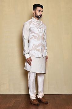 Cream abstract pattern embroidered bundi. Comes with white asymmetric hem cut kurta and churidar. - Aza Fashions Kurta Set Men, Nehru Jacket, Cream Silk, Churidar, Kurta Set, Embroidered Silk, Asymmetric Hem, Aza Fashion, Abstract Pattern