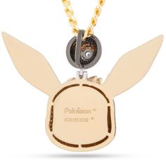 the pokemon pocket watch is attached to a chain with a gold plated pendant on it