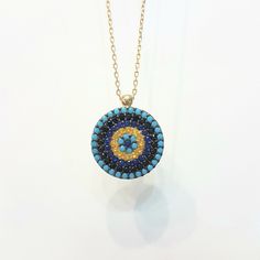 -The evil eye round design women jewelry pendant is made with high-quality 14K real solid gold. - We recommend you to review our other bracelets and necklaces. We have listed many kinds of beautiful and trendy gold and silver products. You won't regret! https://www.etsy.com/shop/LatikaJewelryShop - High polish finish and set with flawless cubic turquoise, black, yellow and navy blue zirconia stones. Its diameter is 1.5 cm. - This dainty, charm, elegant, cute, delicate and trendy women jewelry pe Yellow Gold Evil Eye Medallion Jewelry, Yellow Gold Jewelry With Evil Eye Medallion, Yellow Gold Medallion Jewelry With Evil Eye, Gold Plated Evil Eye Round Necklaces, Gold Plated Round Evil Eye Necklace, Gold Plated Evil Eye Round Necklace, Gold Plated Evil Eye Jewelry, Yellow Gold Evil Eye Round Pendant Necklace, Yellow Gold Evil Eye Round Necklace