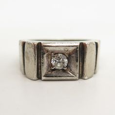 925 Sterling Silver Vintage C Z Modernist Ring Size 8.5Weight: 8.4gWELCOME TO PAWN SHOPWe are an actual pawn shop and have been in business for over 25 years.Since 1990, our establishment has been serving a variety of clients by providing them with short term cash solutions and options of liquidity regarding their treasured heirlooms.Acknowledging that today′s customers are very sophisticated and are looking for a variety of investments, our acquisitions are hand-picked for our special clientele Vintage White Gold Signet Ring With Center Stone, Art Deco Silver Signet Ring With Polished Finish, Silver Art Deco Signet Ring With Polished Finish, Art Deco Silver Diamond Ring With Polished Finish, Silver Art Deco Diamond Ring With Polished Finish, Silver Diamond Ring With Polished Art Deco Style, Art Deco Silver Signet Ring, Classic Diamond Ring For Collectors, Classic Silver Diamond Ring For Collectors