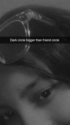 a close up of a person wearing goggles with the words dark circle bigger than friend circle