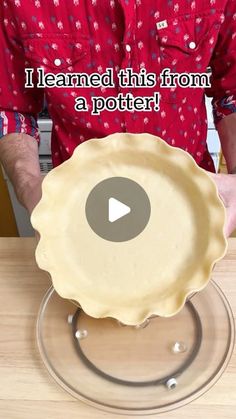 a man is holding a pie pan with the words i learned this from a potter