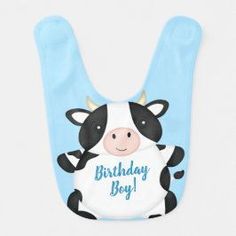 a baby bib with a cartoon cow on it's chest that says birthday boy