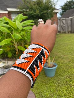 Handmade with snap buttons closure Unique Adjustable Cuff Beaded Bracelets, Handmade Orange Cuff Bracelet Gift, Traditional Multicolor Handmade Cuff Bracelet, Handmade Orange Adjustable Cuff Bracelet, Handmade Adjustable Orange Cuff Bracelet, Handmade Orange Cuff Bracelet Bangle, Handmade Orange Bangle Cuff Bracelet, Adjustable Orange Cuff Bracelet, Handmade Orange Cuff Bangle