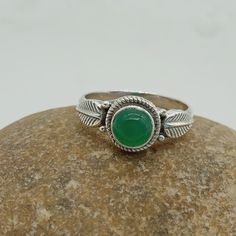 Green onyx Gemstone 925 silver ring with stylish design for your daily wearing accessories. This green stone also know as green onyx stone boho ring can make your daily fashion goals more interesting  and trendy. The green onyx associated with Mercury (Buddha) planet. which help you to financial clearance and sort out, educational and medical recovery   and help you to maintain it. If you searching for something that gives your fashion style extra wing and helps you in health benefits, financial success than this stone ring is for you. This can be the perfect gift for your loved ones, family and friends.  Rings Details  Metal: 925 Sterling Silver Gemstone : Green onyx Gemstone Shape: Round SKU :  Ring59 Ring Size : All Size Available For more new arrivals  and discount please favorite our Bohemian Green Crystal Ring, Adjustable Green Bohemian Rings, Bohemian Adjustable Emerald Ring, Bohemian Green Crystal Round Ring, Bohemian Emerald Ring With Natural Stones, Bohemian Round Emerald Gemstone Ring, Green Bohemian Crystal Ring, Bohemian Handmade Emerald Ring, Bohemian Round Emerald Ring