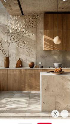 an image of a kitchen with wood cabinets and white tile flooring on the walls