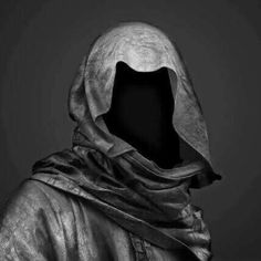 a black and white photo of a person wearing a hooded jacket with a hood on