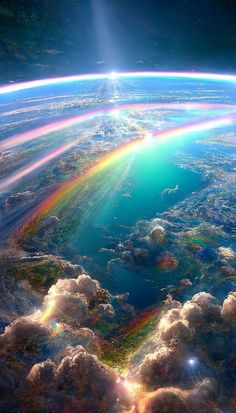 the sun shines brightly through clouds and rainbows in this view from outer space