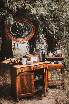 an old fashioned bar is set up in the woods