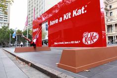 there is a giant kitkat advertisement on the street