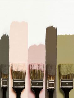 three paint brushes with different colors on them