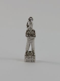 "This is a vintage \"Twelve Foot Davis Memorial Statue Peace River\" sterling silver charm for a charm bracelet.  It weighs 3.25 grams and measures 3/8\" x 1 1/4\" marked \"STER\" All charms come with a split ring to attach to a bracelet. We have hundreds of charms in stock. If you don't see what you are looking for in our shop please contact us as it is likely we have it. Inventory #9079" Collectible Nickel-free Sterling Silver Charms, Personalized Sterling Silver Charms For Collectors, Nickel-free Silver Charms Souvenir, Nickel-free Silver Charms For Souvenir, Panda Charm, Peace River, Memorial Statues, Birthday Bracelet, Puffy Heart