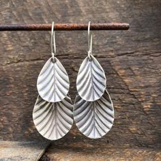 Leaf dangle drop Hilltribe silver earrings Approximate dimensions ; L 56mm x W 29mm Thai Karen Hill Tribe Silver contains 97-99% pure silver - higher than sterling silver's 92.5%. Higher silver content results in natural, lustrous texture and color. High-content silver is softer and easier to shape into beautiful, ornate styles. Using methods that have been passed down for generations, each piece has been individually handcrafted by skilled craftsmen from the native Karen Hill Tribe of Northern Bohemian Silver Drop Jewelry, Nickel Free Leaf-shaped Sterling Silver Jewelry, Nickel Free Leaf-shaped Sterling Silver Earrings, Nickel-free Sterling Silver Leaf-shaped Earrings, Nickel Free Sterling Silver Leaf-shaped Earrings, Silver Sterling Silver Teardrop Dangle Earrings, Hypoallergenic Sterling Silver Leaf-shaped Earrings, Silver Teardrop Earrings With Oxidized Finish As Gift, Oxidized Silver Long Drop Jewelry