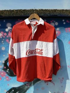 So, actually, my dad had this one. Mine was a lovely melon color. Coolness. Coca Cola Shirt, Vintage Coca Cola, Coca Cola Vintage, Vintage Clothes, The Good Old Days, Rugby Shirt, Augmented Reality, Look Cool, New Vintage