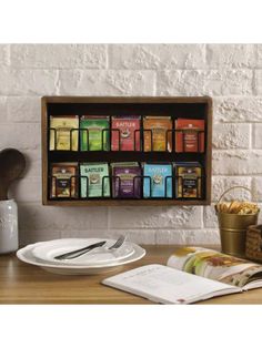 a wooden shelf filled with lots of different types of food