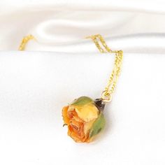 An everlasting durable jewelry with real roses: Because we treated these roses with resin, they are very durable and will not break easily. If the jewelry with roses is kept well by the owner, the jewelry can last forever. Thanks to the 925 sterling silver elements, the roses will become an heirloom that will never die.  ✓ Preserved Rose    ✓ Inspired by Nature  ✓ Bridesmaid Gift Saffron Yellow  Looking for something unique and different? Look no further than this wonderful saffron yellow rose b Dainty Rose Necklace As Gift, Dainty Rose Necklaces For Gifts, Dainty Rose Necklace For Gift, Dainty Rose Necklace For Gifts, Dainty Rose Design Jewelry As A Gift, Delicate Rose Necklaces For Gifts, Dainty Rose Design Jewelry For Gifts, Dainty Rose Design Jewelry Gift, Delicate Rose Necklace For Gift