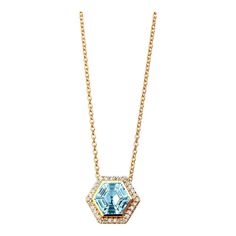 Created in 18 karat yellow gold  Blue topaz 1.50 carats approx.  Diamonds 0.15 carat approx.  18 inch, adjustable at 16-17  Limited edition    Fashioned from 18 karat yellow gold, this limited edition necklace features a magnificent blue topaz gemstone at 1.50 carats and 0.15 carats of sparkling diamonds. The adjustable chain measures between 16-17 inches.    About the Designers ~ Dharmesh & Namrata    Drawing inspiration from little things, Dharmesh & Namrata Kothari have created an extraordinary and refreshing collection of luxurious jewels. True believers of destiny, they always feel that the possibilities of design - and life - are limitless when people work together. Formed in 2003, Syna Jewels has grown through enduring relationships with well known, established companies and have ev White Gold Pendant Necklace, Contemporary Necklace, Blue Topaz Gemstone, Art Deco Pendant, Modern Necklaces, Gemstone Necklace Pendant, Modern Pendant, Topaz Gemstone, Gold Pendant Necklace