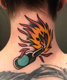 a woman with a tattoo on her neck has a fireball in the shape of a bomb