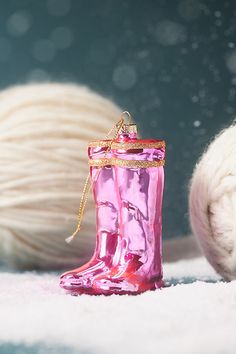 Unwrap the season with our Holiday 2024 collection, where magic meets merriment, featuring a gleaming pair of pink cowboy boots that are ready to kick up some serious holiday spirit. | Pink Rainboots Glass Ornament by Anthropologie Girly Christmas Tree Ornaments, Iridescent Pink Christmas, Pink Wellies, Pink Ice Skate Ornament, Silver Tinsel Tree, Heart Ornament Pink, Bright Pink Ornaments, Silver Baubles, Pink Cowboy Boots