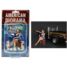 a toy truck with a woman sitting on the bed and an american diorama figure next to it