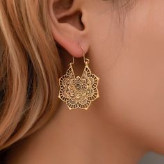 These earrings are perfect for any occasion. They are light and easy to wear, and they make a statement. These earrings are handmade and come with a beautiful mandala design. They are a great way to add some bohemian flair to your outfit. These earrings are perfect for the bohemian girl who wants to add a little something to her look. They're light and easy to wear, and they'll go with any outfit. It's a beautiful piece to adorn your look Looks great with any outfit. Lightweight, compact and dur Flower Earrings Gold, Boho Style Earrings, Floral Pendant, Moda Vintage, Metal Earrings, Pendant Earrings, Boho Earrings, Flower Earrings, Vintage Earrings