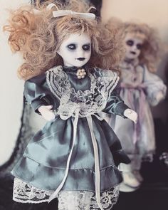 a creepy doll is standing next to a mirror