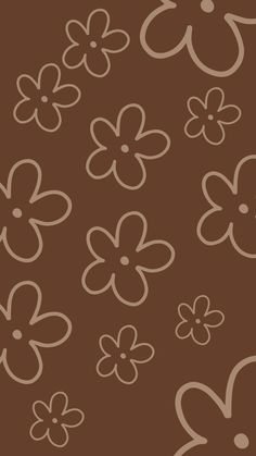 a brown background with white flowers on it