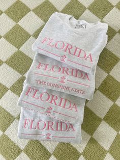 Florida - The Sunshine State. This crewneck color is the perfect mix between orange and pink. It's giving endless summer vibes and we're here for it! Unisex fit, runs true to size. Cute Crewneck Sweatshirt, Lounge Outfits, Cute Crewneck, Sewing Appliques, Embroidered Tee, Embroidery Sweatshirt, Embroidered Crewneck, Cute Preppy Outfits, Orange And Pink