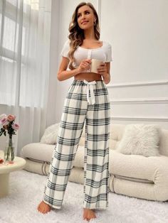 Elevate your relaxation game with our Plaid Printed Tie Front Sleep Pants. Embrace casual comfort in style with the charming bow front and knot details. Designed for ultimate relaxation, the loose fit and soft 100% Polyester composition ensure a cozy night's sleep. Long length, non-stretch fabric, and easy care instructions make lounging a breeze. Experience the perfect blend of fashion and comfort today! Features: Style: Casual Pattern Type: Plaid Details: Bow Front, Knot, Tie Front Type: Pajam Casual Wide-leg Sleep Pants, Loungewear Pants With Tie Waist, Tie Waist Loungewear Pants, Casual Loungewear Pants With Tie Waist, Loungewear Tie Waist Long Pants, Casual Lounge Pants With Tie Waist, Tie Waist Lounge Pants, Casual Pants With Tie Waist For Loungewear, Pants Gift