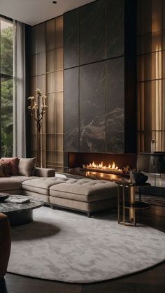 a living room with a couch, chair and fire place in the middle of it