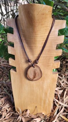 Hand made and hand burnt onto natural Australian gum tree wood. This Feather necklace is one of a kind and sure to create a statement with any outfit. Adjustable Natural Wood Necklaces, Natural Wood Pendant Necklace, Red Wood Necklace, Adjustable Natural Wood Necklace Nature-inspired, Artisan Natural Wood Pendant Necklace, Hand Burn, Feather Necklaces, Handmade Wooden, Necklace Etsy