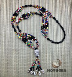 a beaded necklace with beads and charms