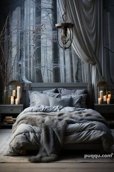 a large bed sitting in a bedroom next to a forest filled with trees and candles