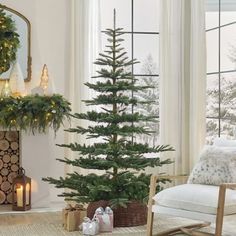 a living room filled with furniture and a christmas tree