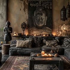 a living room filled with lots of furniture next to a buddha painting on the wall