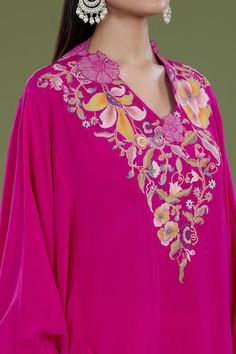 Rani pink high low kaftan with french knots, thread embroidery in floral pattern on neckline. Paired with pant. - Aza Fashions Pink Embroidered Anarkali Kaftan, Pink Intricately Embroidered Kaftan For Eid, Pink Embroidered Kaftan For Eid, Pink Intricate Embroidery Kaftan For Eid, Festive Pink Kurta With Embroidered Neckline, Pink Floral Embroidered Kaftan For Wedding, Spring Pink Embroidered Kaftan, Spring Embroidered Pink Kaftan, Pink Chikankari Embroidery Kaftan For Spring