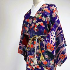 Welcome to my shop the vintage Japanese obi belt, kimono. One by one, made by hand, the only one of its kind in the world. This is an original Japanese vintage cotton Kimono in purple. It fits any size and is perfect for summer, as it is an unlined Hitoe Kimono. It is cleaned and in very good vintage condition. Details 👘 Good Vintage Condition cotton Length 130cm (51.18") Width 60 cm (23.6") One Size Why should you by from us? Our Kimonos have a history and a story to tell. They are original Japanese vintage and therefore of the finest quality and sustainable on top. We clean our kimonos to get rid of the dust and smell of the past and make them ready to wear. Because that's the way we would like to buy them! *The colours on your screen might differ slightly from the actual kimono colours Floral Print Kimono For Tea Ceremony, Traditional Floral Print Kimono For Tea Ceremony, Traditional Long Kimono With Floral Print, Traditional Long Floral Print Kimono, Purple Floral Print Kimono With Kimono Sleeves, Japanese Obi Belt, Belt Kimono, Baby Kimono, Japanese Obi