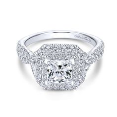 an 18k white gold princess cut diamond engagement ring