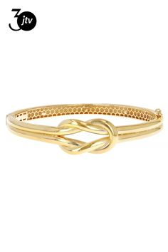 18k Yellow Gold Over Sterling Silver Knot Design Bangle. Measures approximately 9/16 of an inch in width and has a hinged closure. Knot Design, Knot, 18k Gold, Bangles, Yellow Gold, Sterling Silver, Yellow, Silver, Gold