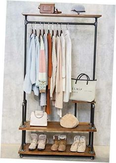 a rack with clothes and shoes on it