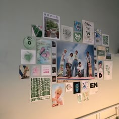 a white refrigerator covered in pictures and magnets