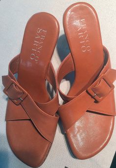 Thank you for visiting my shop! Vintage Franco Sarto tan wedge sandal  Franco Sarto is one of the most loved shoe brands in the world!! Franco was born in Italy and started his career as a designer at 14 years old. His shoes, sandals, and boots use high-quality material such as Real Leather All the best,  Leila Tan Wedge Sandals, Tan Wedges, Aqua Color, Franco Sarto, Wedge Sandal, All The Best, Shoe Brands, Nine West, Slip On Sandal