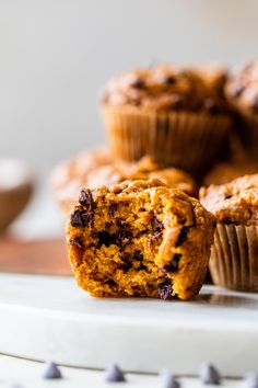 muffins on a plate with one cut in half