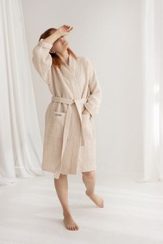 "Relaxed fit, long sleeved, belted, with two front pockets bathrobe in soft light waffle linen for your comfortable and eco-friendly living. Unique waffle texture makes this bath robe soft and pleasant to touch, allows your skin to breath and to feel cozy. Perfect for SPA, SAUNA or MASSAGE time. Natural linen & cotton fabric makes these rituals even more special. Standard length for all sizes (approx.) - 100-105 cm /39-41 inches. If you need different length, feel free to ask. Available sizes an Cotton Long Sleeve Robe For Spa, Long Sleeve Cotton Robe For Spa, Long Sleeve Cotton Spa Robe, Long Sleeve Cotton Robe For Wellness, Spa Lounge, Robe For Women, Spa Sauna, Linen Robe, Lounge Robes