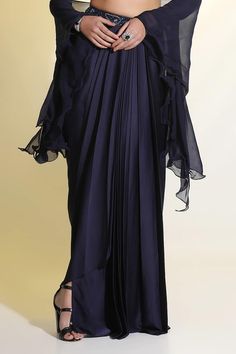 Dark navy blue blouse featuring sequin, mirror and cutdana hand embroidery flowers. Paired with a draped skirt and dupatta. - Aza Fashions Elegant Draped Dupatta With Resham Embroidery, Elegant Draped Resham Embroidery Dupatta, Party Wear Dupatta With Resham Embroidery, Draped Georgette Dress With Sheer Dupatta, Evening Lehenga With Dabka Work For Eid, Eid Evening Pre-draped Saree With Mirror Work, Elegant Diwali Dress With Cape Sleeves, Evening Pre-draped Saree With Mirror Work For Eid, Elegant Dress With Cape Sleeves For Diwali